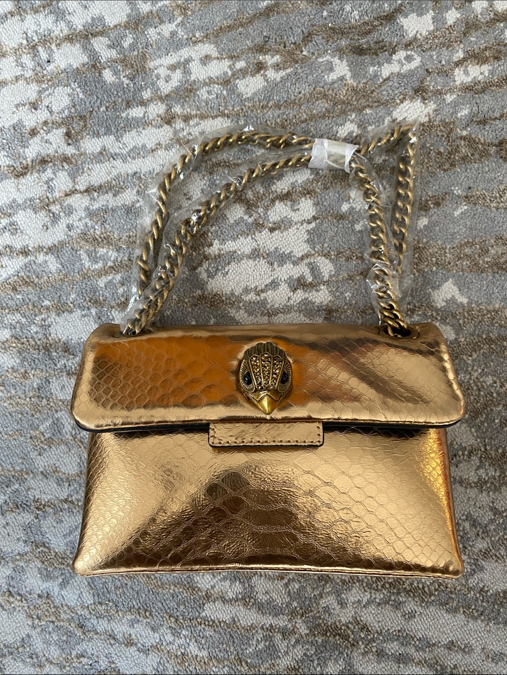 Kurt Geiger Mini Kensington X in Gold